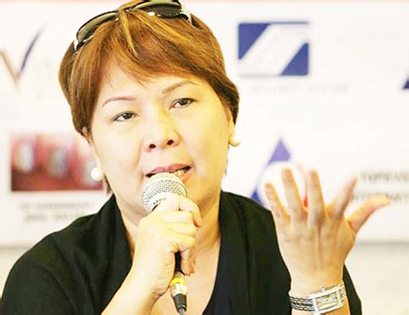 Sandra Cam voluntarily surrenders in Masbate .